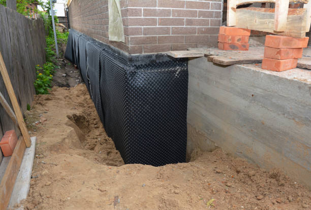 Happy homeowners after waterproofing job in Chester